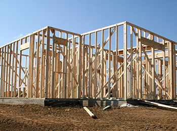 Image of a partially-built house linking to the Build On Your Lot site