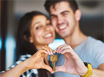 Photo of a smiling couple linking to the East Texas Rent Homes site